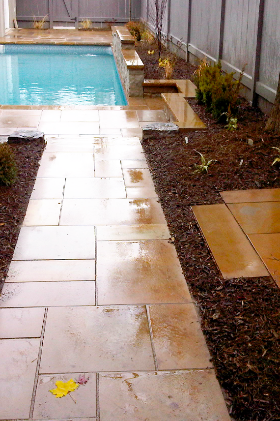 Beautiful natural stone deign walkway to pool area